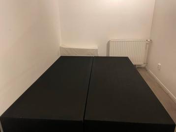 Gratis zwarte boxspring