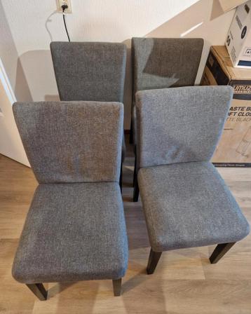 4x eetkamerstoel grijs stof met zwarte houten poten