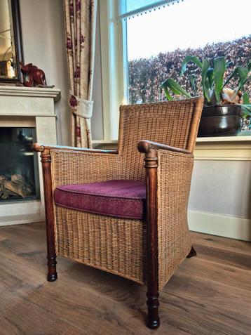 Rieten stoel met los zitkussen