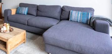 Bank met chaise longue en opbergruimte