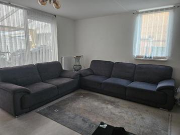 Grijze stoffen bankstel 3-en 2 zits