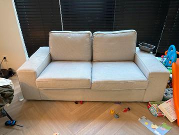 Grijze tweezitsbank - Comfortabel en stijlvol