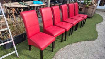 12 leren stoelen gratis af te halen