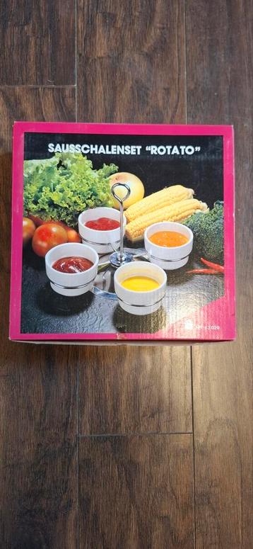 Gratis draaibare saus standaard