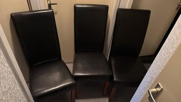 Drie zwarte lederen eetkamerstoelen GRATIS