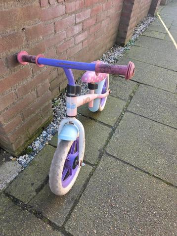 Roze/paarse loopfiets voor kinderen