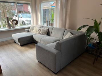 Gratis grijze hoekbank