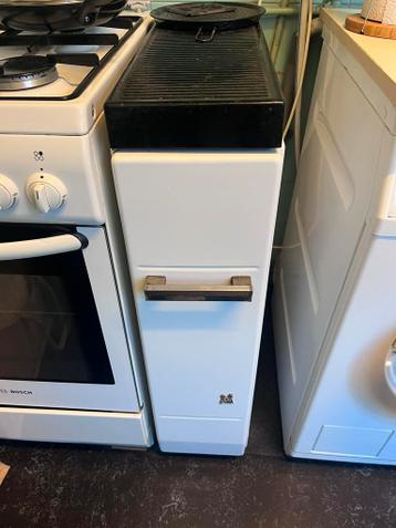 Smalle oude gaskachel