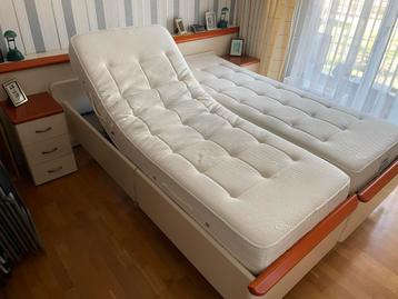 Twee eenpersoons bedden met verstelbare Auping bodem