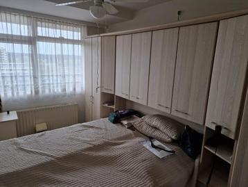 Grote kast met geïntegreerd tweepersoonsbed