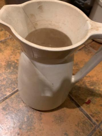 Crème plastic kan met handvat