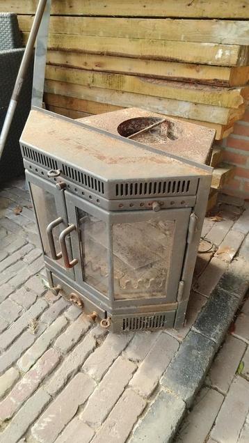 Oude houtkachel voor binnen, gratis af te halen