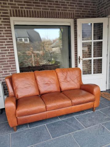 Gratis lederen zitbank en bjjbehorende fauteuil