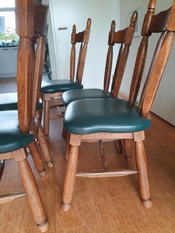 5 eetkamerstoelen eikenhout met donkergroene leren bekleding