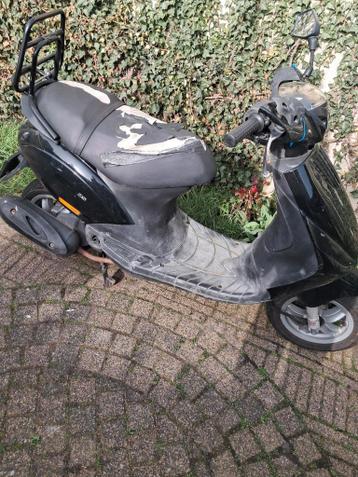 Piaggio zip 25cc rijdt niet meer papieren zitten erbij