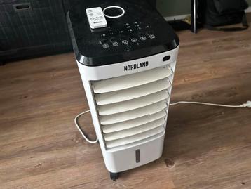 Gratis: Nordland luchtkoeler met remote + poef + stoel