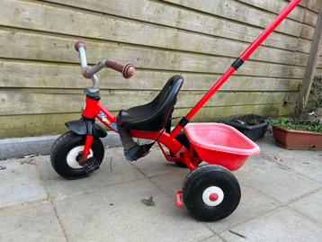 Rode driewieler met duwstang