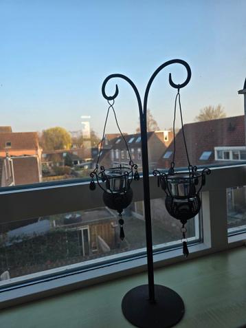 Zwarte kaarsenhouder gratis op te halen