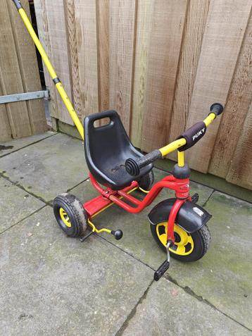 Puky driewieler met duwstang - rood/geel
