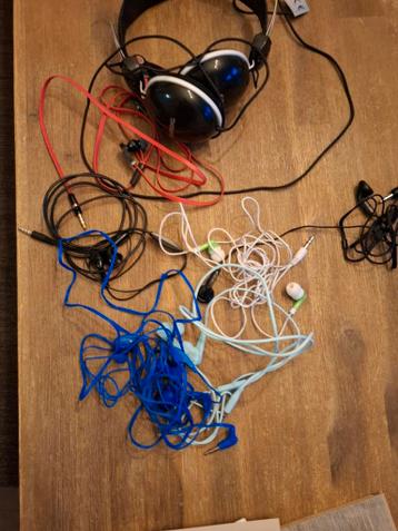 Koptelefoon en oordopjes - Zo goed als nieuw