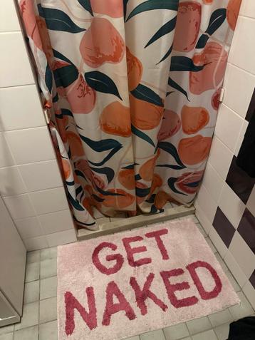 Roze douchegordijn en badmat set