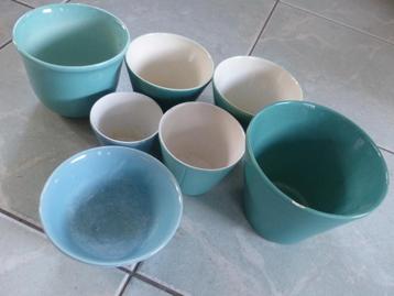 Blauw-groene bloempotten