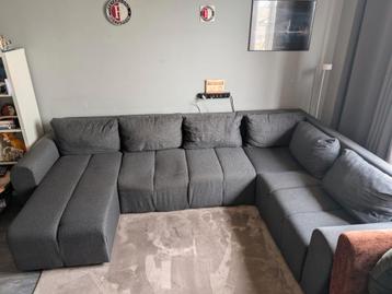 Grijze hoek slaap bank