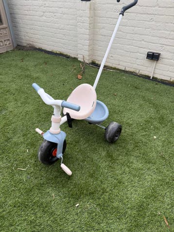 Loopfiets en driewieler met duwstang