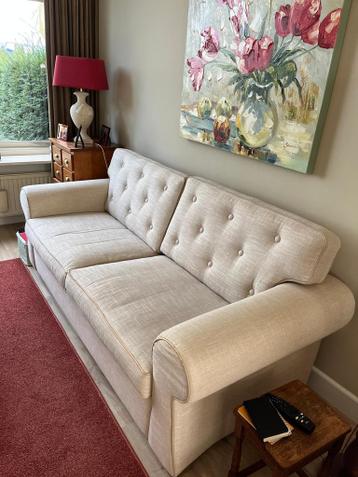 Set van neutrale 3-zits bank en 2 stoelen met bloemenprint