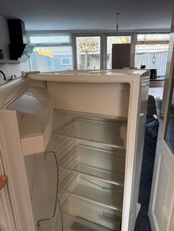 Gratis koelkast met defect klepje van vriezer