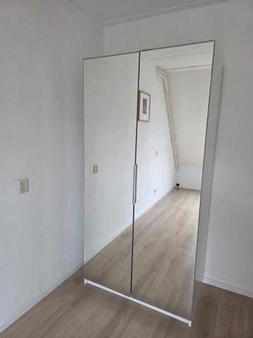Gratis IKEA kast met spiegeldeuren en veel opbergruimte
