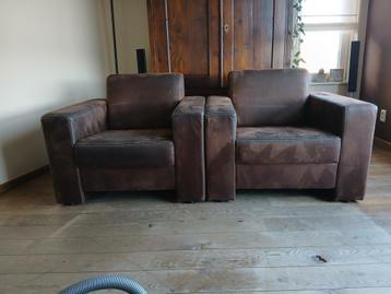 Twee degelijke bruine fauteuils - Gebruikt