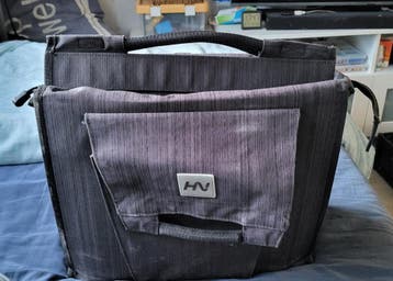 Gratis Enkelzijdige fietstas met zadel en zadelpen