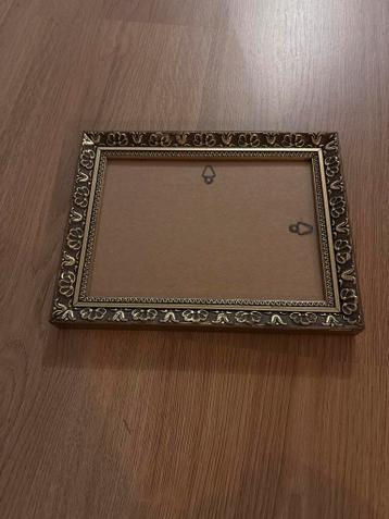 Vintage fotolijst goudkleurig met sierlijke details