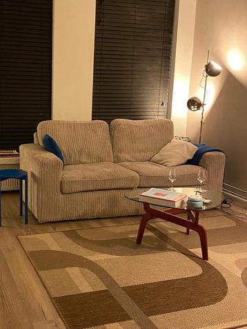 Gratis Comfortabele licht beige bank