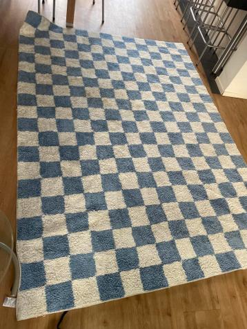 Blauw en wit geblokt kleed 1.80 boj 2,50