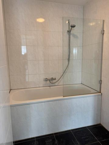 Ligbad met douchewand