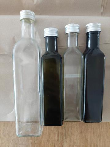 Lege olie flesjes