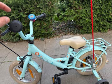 Gratis! Leuke kinderfiets met zijwieltjes en Spiderman bel