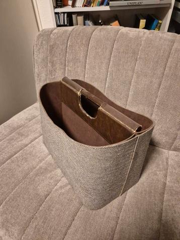 Bekleed bakje voor bijv. kranten