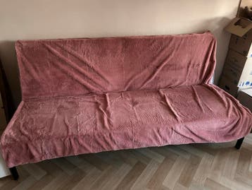 Grijze slaapbank met stalen poten