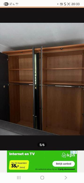 Mooie grote kledingnkast,met 2 spiegels gratis