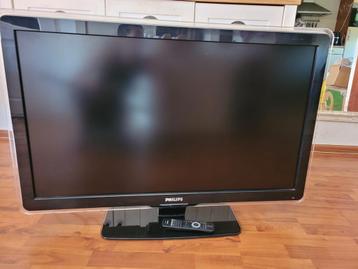 Philips tv met afstandsbediening en muurbeugel