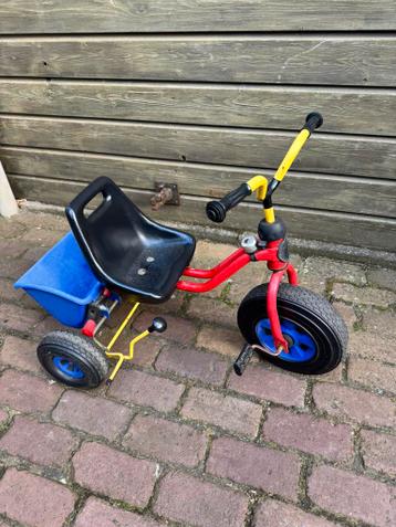 Gratis bont gekleurde drie wieler