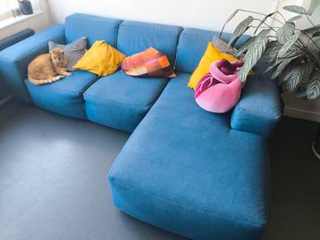 Blauwe hoekbank met chaise longue