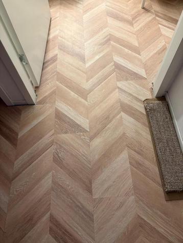 Prachtig laminaat in visgraatpatroon - Zo goed als nieuw