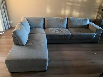 Grijze hoekbank met rechtse hoek
