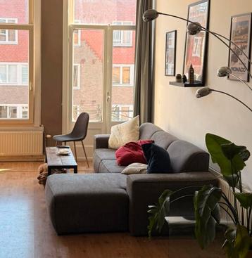 Donkergrijze L-vormige bank in 2 delen