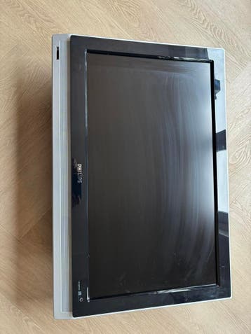 Philips flatscreen met wandbevestiging