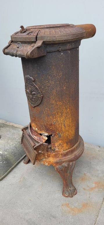 Oude roestige kachel gratis af te halen